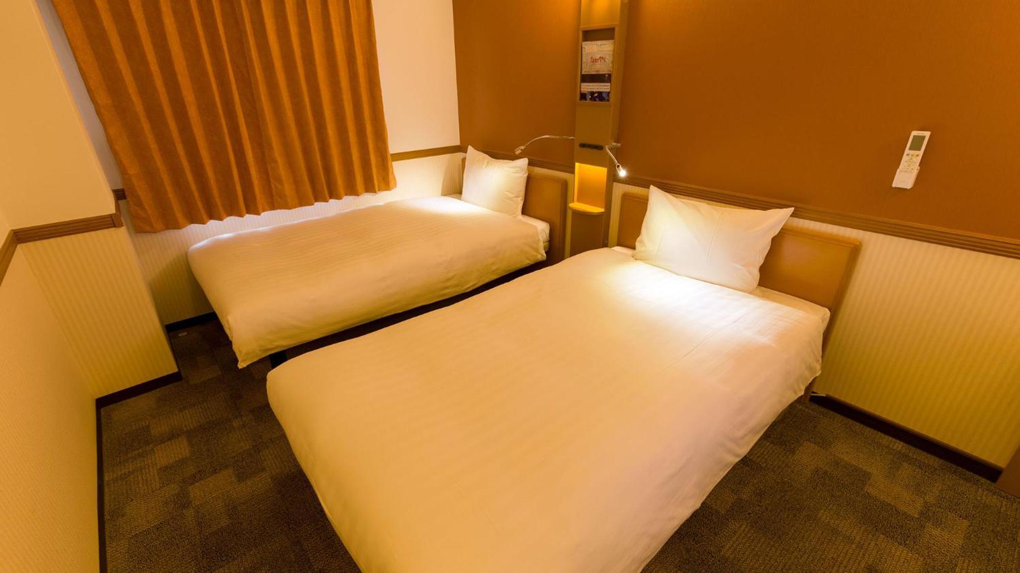 Toyoko Inn Kanazawa-Eki Higashi-Guchi Rum bild