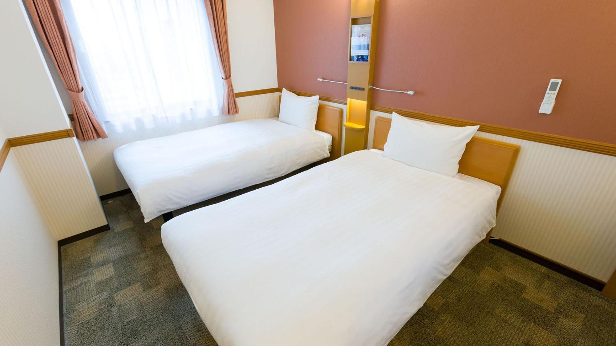 Toyoko Inn Kanazawa-Eki Higashi-Guchi Rum bild