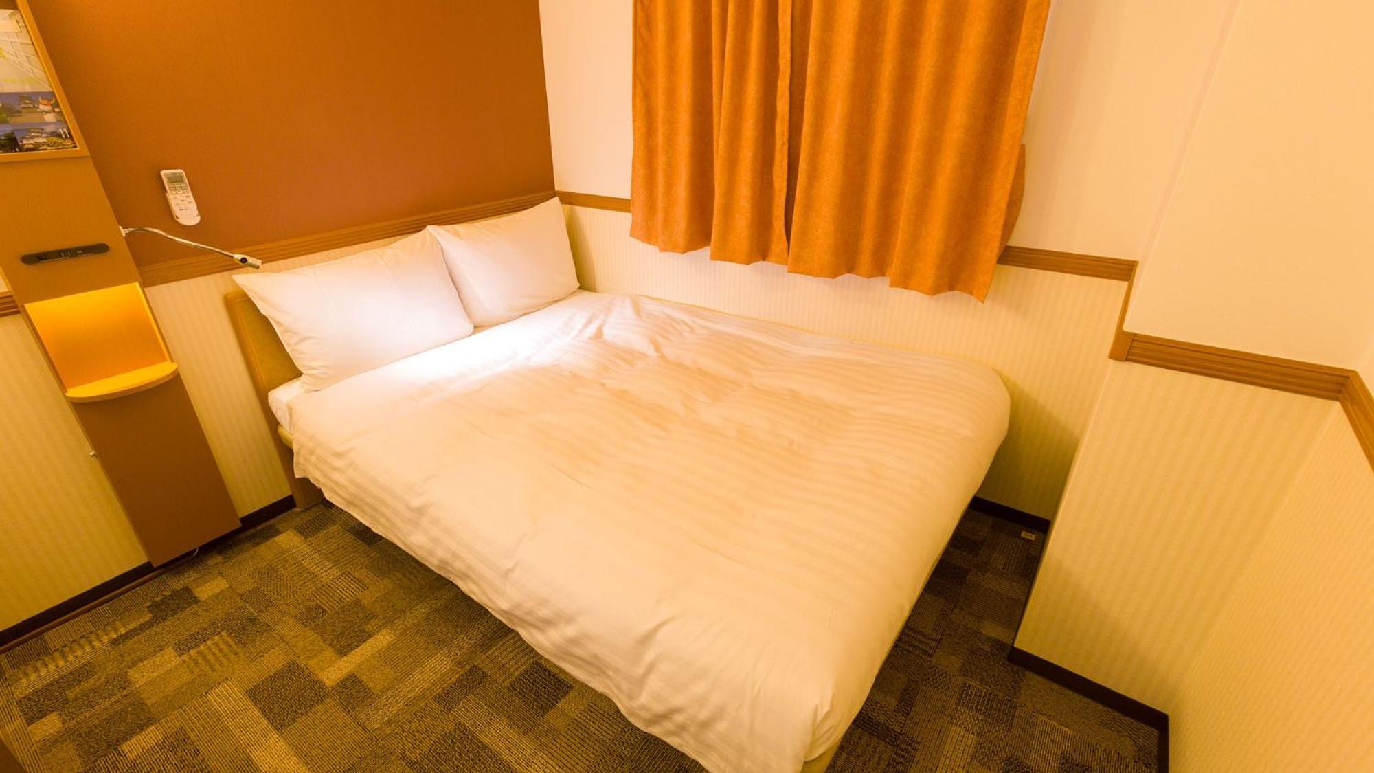 Toyoko Inn Kanazawa-Eki Higashi-Guchi Rum bild